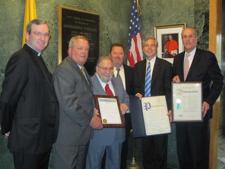 From left, the Rev. Thomas Collins, president of Stepinac High School; William F. Plunkett, chairman of the board; Ron Tedesco, honoree; Paul Carty, principal; Thomas Roach, mayor of White Plains; and Kevin Plunkett, deputy county executive.
