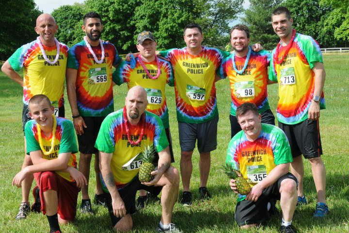 Members of the Greenwich Police Department competed in the Pineapple Classic 5K with obstacles last year.