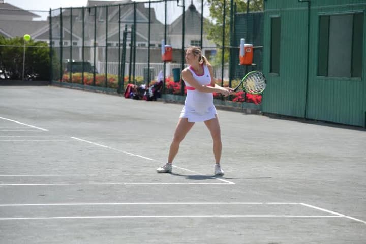 At nine-months pregnant, Saw Mill Club&#x27;s tennis captain Whitney Thompson has not slowed down. 