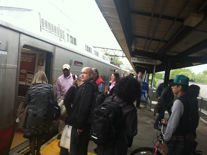 Commuters boarding at Greenwich, Conn., train station an 8:22 a.m. train to Grand Central. 