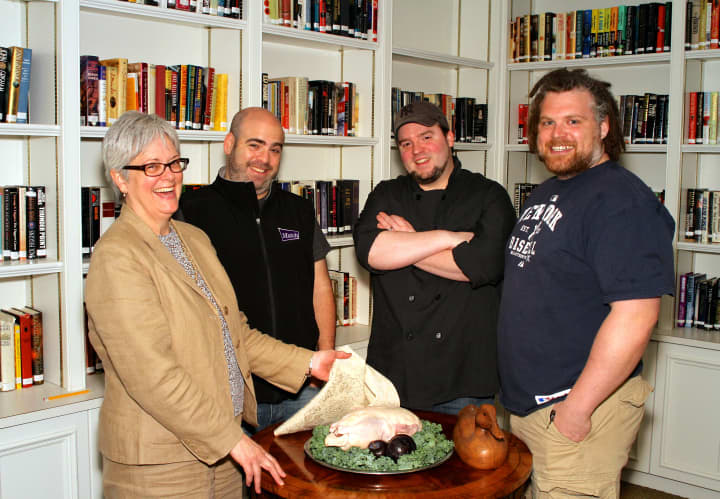 Matt Storch, a chef, second from left; shown here with Grace Weber, executive director of Founders Hall, Forrest Pasternack and Jeff Taibe, will be featured guest in cooking series at Fairfield Library.
