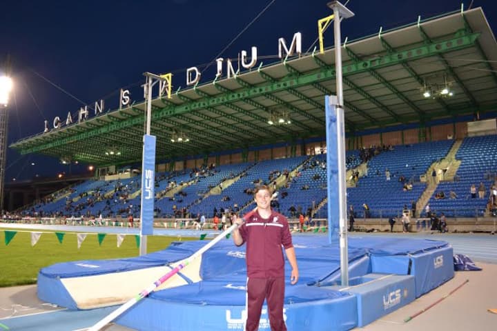 Harrison&#x27;s James Duetmeyer after his record-breaking jump at Icahn Stadium.