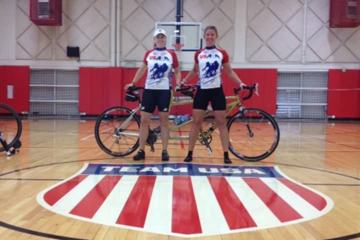 Amy Dixon, left, with her tandem pilot Lindsey Cook, will compete Sunday in Dallas in the  Pan American Triathlon Confederation championships.