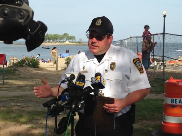 Norwalk Police Lt. Paul Resnick answers questions Monday at Calf Pasture Beach. 