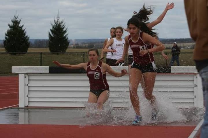 New Canaan&#x27;s Stephanie Benko, left, competes in steeplechase for Lafayette College.