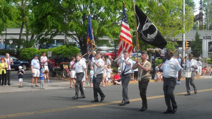 The Memorial Day Parade steps off in Darien. 