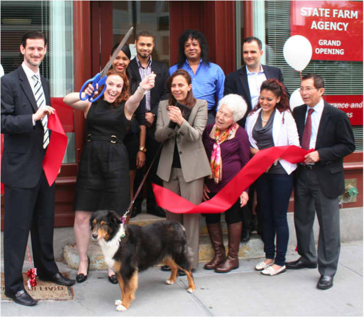 Yonkers officials and State Farm employees celebrate the opening of the insurance company&#x27;s new location -- and a donation to local animal shelters.