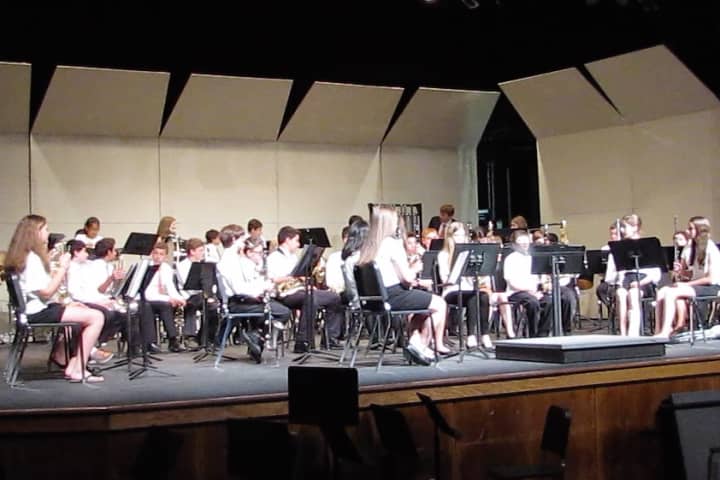 The Valhalla Middle School orchestra performs at the New York State School Music Association evaluation festival.