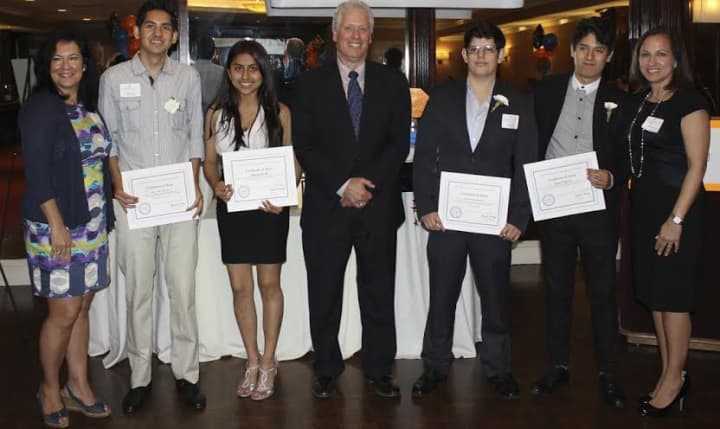 Latino U honorees join Michael Kaplowitz, chairman, Westchester County Board of Legislators and the Westchester Hispanic Advisory Committee, at a graduation celebration held Saturday, May 31, at Sam&#x27;s of Gedney Way in White Plains.