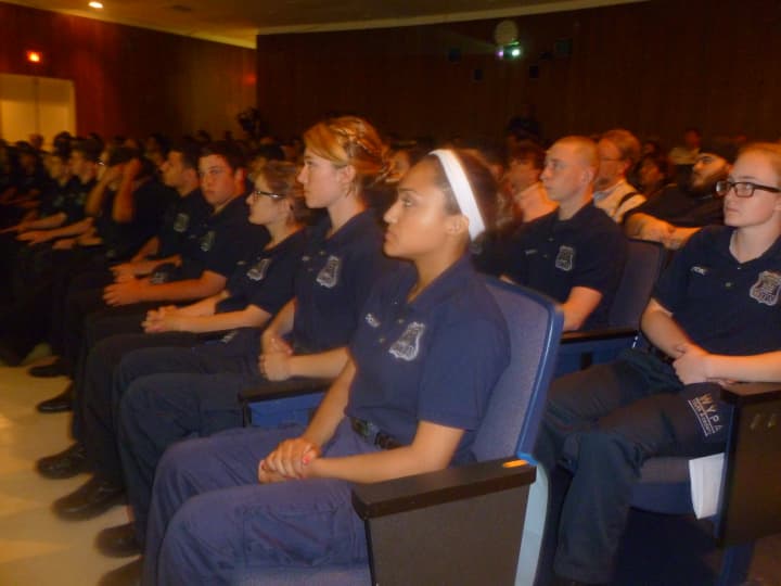 The Westchester Youth Police Academy Class of 2014 listens to the program at Mercy College in Dobbs Ferry on Wednesday, June 4.