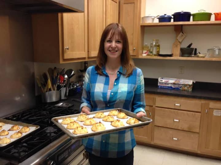 Denise Mickelsen of Danbury, a senior editor at Fine Cooking magazine, makes cookies for the Cookies for Kids Cancer bake sale. 