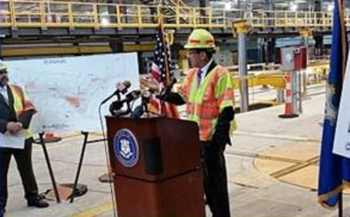 Gov. Dannel Malloy outlines improvements in the New Haven rail yard on Thursday, June 5. 