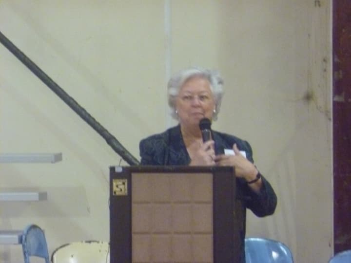 Sandy Galef addresses the audience at Walk In My Shoes in Peekskill. 