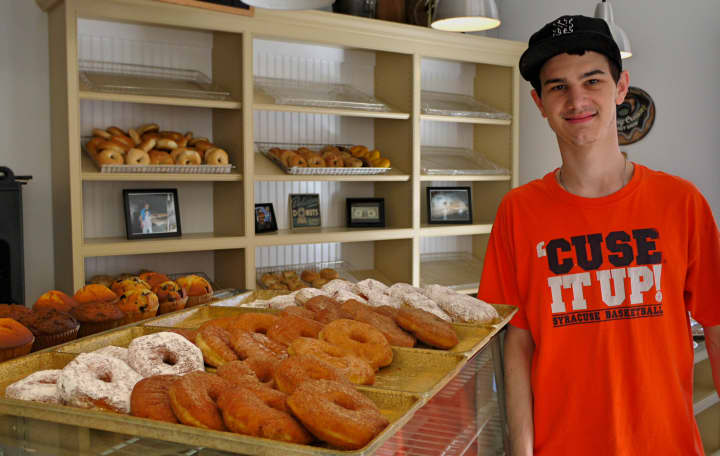 Norwalk resident Leo Spinelli, 22, has opened Uncle Leo&#x27;s Coffee and Donuts with his father in the heart of Georgetown. 