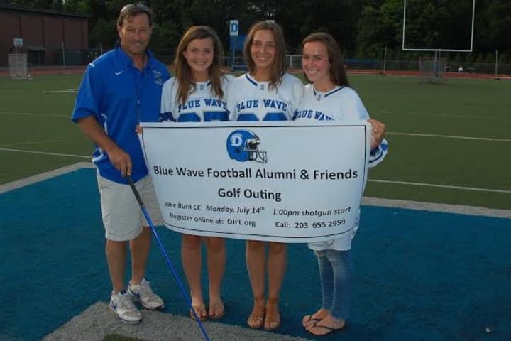Darien football coach Rob Trifone, left, announces the first Darien Blue Wave Football Alumni and Friends golf outing along with managers (from left) Hannah Hickey, Jenny Goersch and Tyson Maley.
