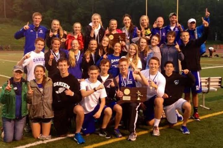 Members of Darien&#x27;s boys and girls track teams celebrate after both squads won State Open championships Monday in Middletown.
