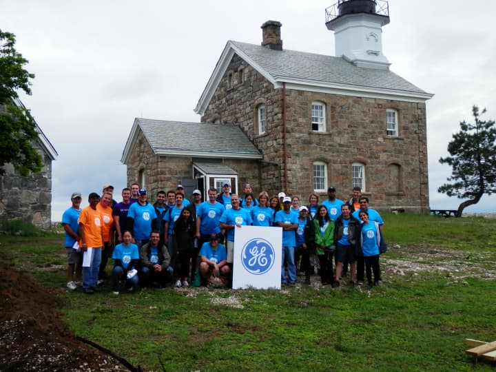 Volunteers from GE Capital Real Estate complete a construction project at Sheffield Island off the coast of Norwalk. 