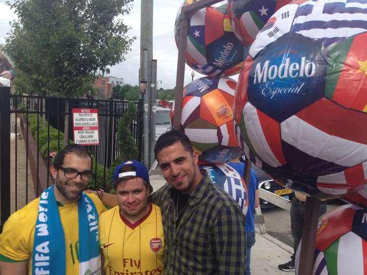 From left, Anthony Melendez, of Peekskill, T.J. Ribeiro, of Tarrytown, and Jason Khoder, of Tarrytown watch the World Cup in Port Chester. 