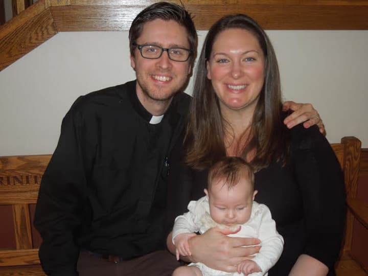 The Rev. Scott Geminn, the new associate pastor at Village Lutheran Chuch and the Chapel School in Broxnville, with his wife, Rebecca Geminn, and daughter, Emma.