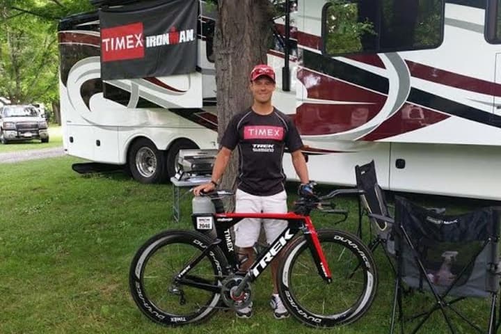 Chris Thomas of Easton was the top amateur Sunday in a 70.3-mile triathlon in Syracuse, N.Y. 