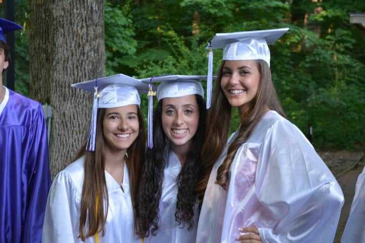 Members of John Jay High School&#x27;s Class of 2014 pose for a photo prior to their commencement.