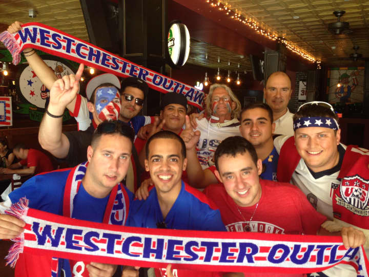 Marc Padro,  front second from left,  of Port Chester, is the president of the American Outlaws Westchester chapter. 