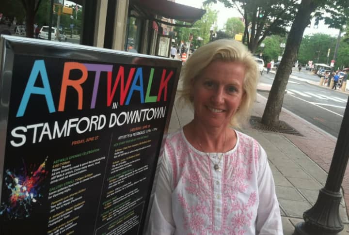 Jackie Wetenhall, director of retail development for the Stamford Downtown Special Services District, stands on Bedford Street where much of the action for ARTWALK will take place. Art is on display in galleries and downtown businesses.