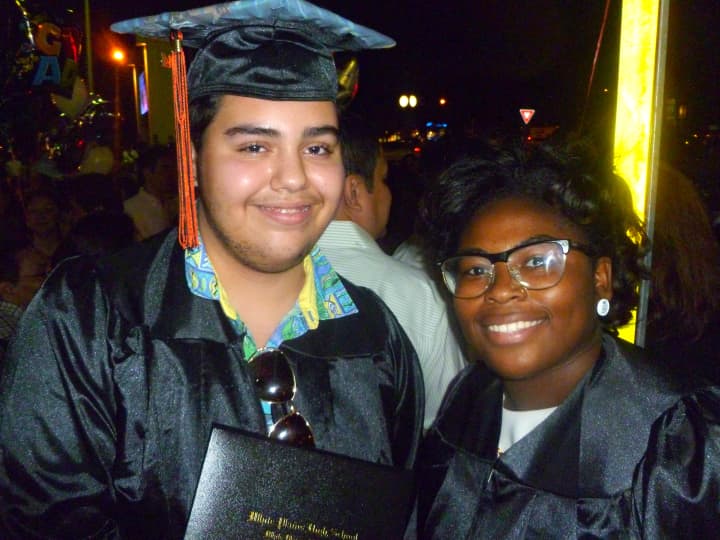 Pedro Jacinto (left) and Iyana Thompson graduated White Plains High School Thursday night. 