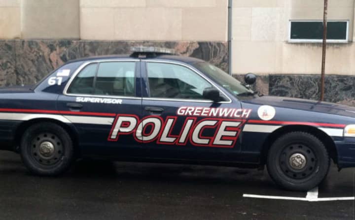 A Norwalk man was charged with second-degree breach of peace after being accused of sunbathing nude at Greenwich Point on Friday afternoon. 