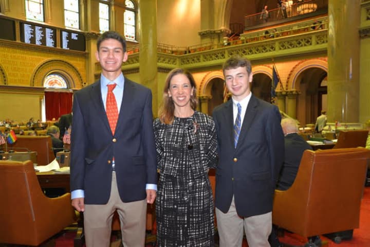 Daniel Wasserman, left, and Matthew Drescher with Assemblywoman Amy Paulin.