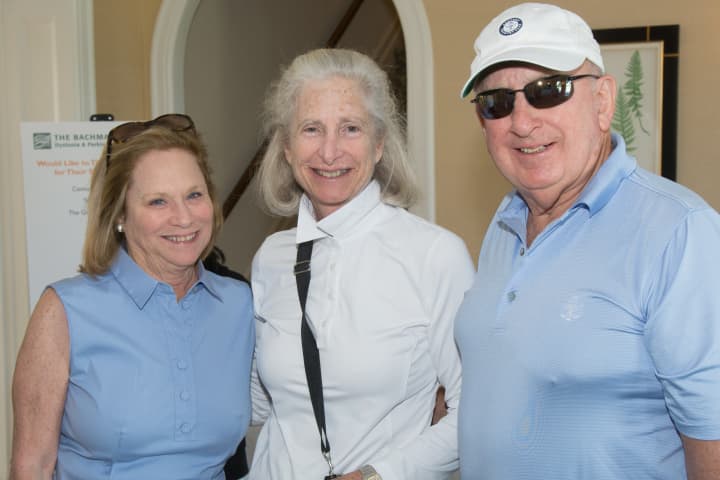 Bonnie Strauss, Susan Cullman and John Kirby are shown at the  22nd annual Bachmann-Strauss Dystonia &amp; Parkinson Foundations Hedi Kravis Ruger Memorial Golf Invitational at the Century Club in Purchase.