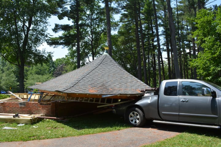 An adjacent truck was damaged by the collapse of an Armonk gazebo roof.