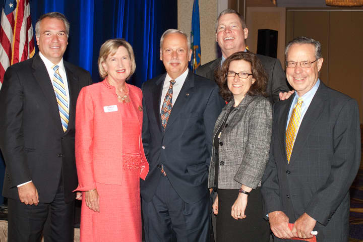 Maggie Wilderotter, second from left, the Chairman and CEO of Frontier Communications, was the keynote speaker at the recent annual meeting of The Business Council. See story for the rest of the people in the photo.