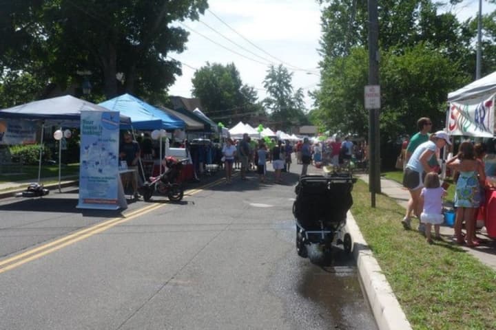 Local businesses, organizations and community members gather at the 2013 Wilton Street Fair and Sidewalk Sale. 