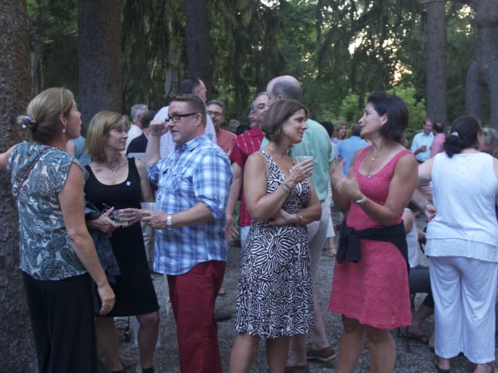 Guests enjoy a Summer Saturday in the Katonah Museum of Arts Sculpture Garden.
