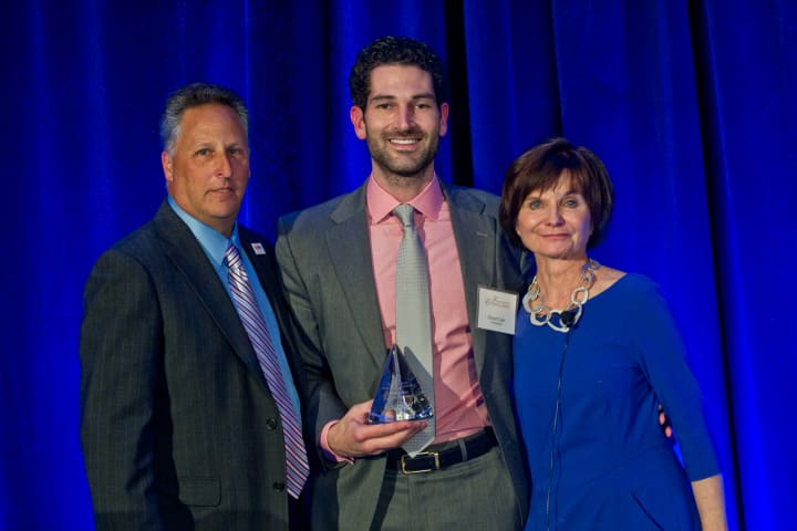 From Left: Dunkin Brands franchisee Mitch Cohen; Dunkin Brands franchisee and 2013 Philanthropist of the Year Shaun Cain of Norwalk; and Karen Raskopf, Senior Vice President and Chief Communications Officer of Dunkin Brands.