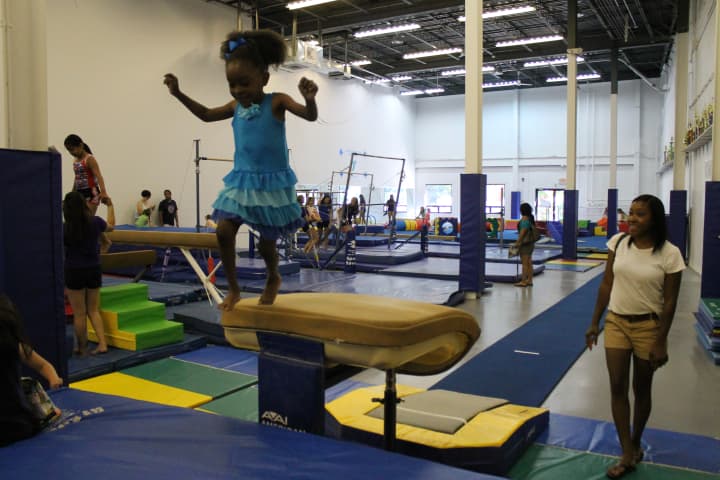 Local families enjoy open play at the new Y Gymnastic Centers grand opening party on June 28 at the new location of 145 Main St. in Norwalk.