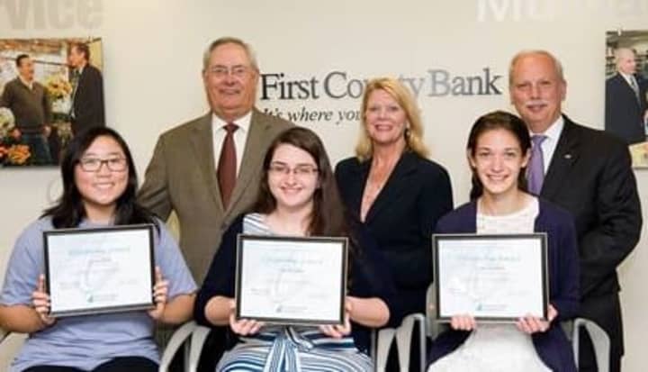 Casey Bang, Lila Sferlazza and Claire Howlett are recipients of the Richard E. Taber Citizenship Award scholarship administered by First County Bank Foundation. Top, Richard E. Taber, Katherine Harris, Reyno A. Giallongo, Jr.