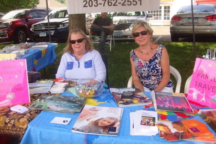 Judith White and Hella McSweeney of Wilton Center Travel said the Wilton Street Fair is good for local businesses.