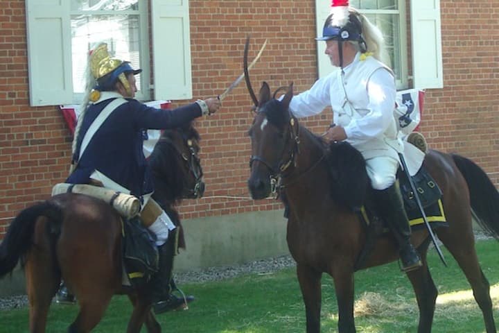 Captain Sal Tarantino and Joe Loyas of the Second Continental Light Dragoons practice cavalry training exercises.