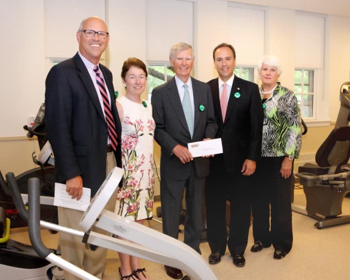 David Ormsby (center), chairman of the Friends of Nathaniel Witherell, presents a check  to Greenwich First Selectman Peter J. Tesei (second from right). Also in photo are (from left) Allen Brown, Debby Lash and Karen Sadik-Khan.