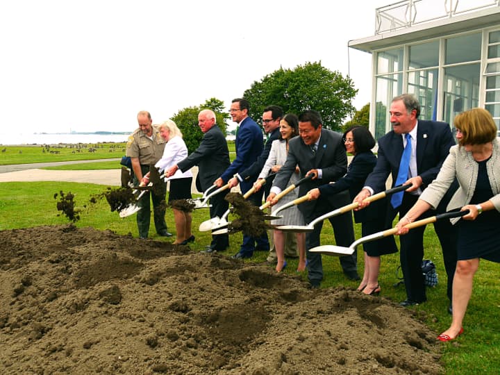 Local lawmakers join Gov. Dannel Malloy and DEEP Commissioner Rob Klee start the digging process at the Sherwood Island State Park Pavilion in Westport. 