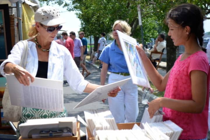 The Westport Fine Arts Festival is set up along the Saugatuck River and features original work from 135 artists.