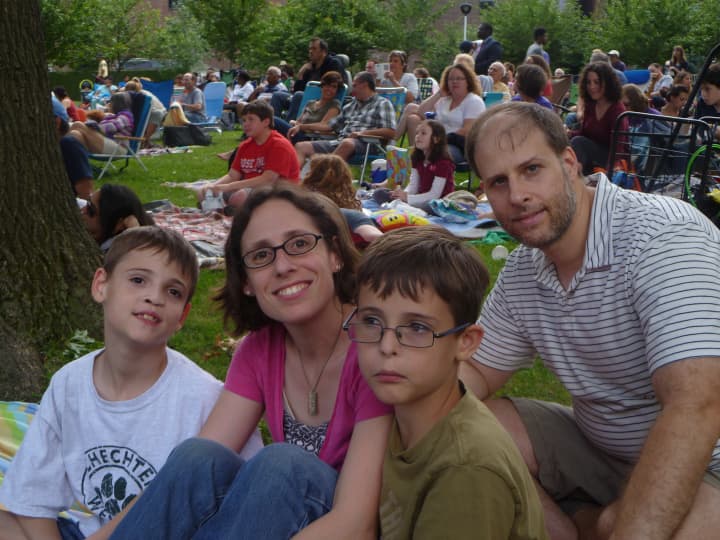 Sarah and Dan Wigodsky bring their children Nadav (left), 9, Alon (second from right), 9 and Deena (not pictured), 9 to watch Shakespeare in the Park. 