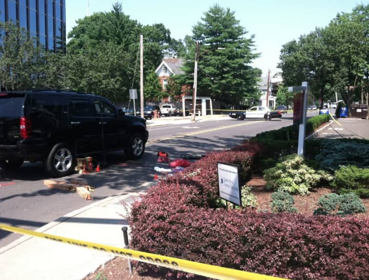 A woman is dead after a Chevrolet Tahoe collided with her while she was walking in the area of the Hoyt and Summer Street intersection Monday afternoon.