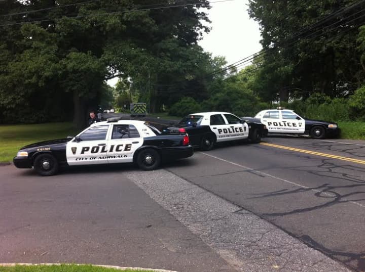 West Rocks Road in Norwalk is blocked by police cars on Tuesday afternoon. 