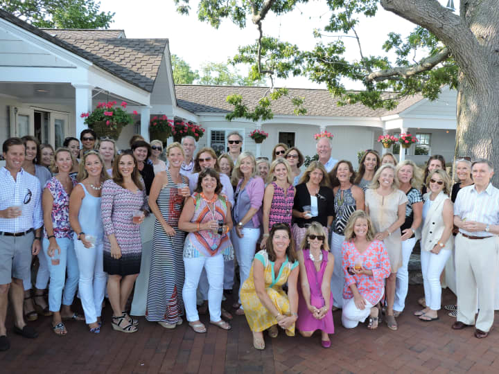 Kelly Associates celebrate real estate success at Darien&#x27;s Wee Burn Beach Club. 