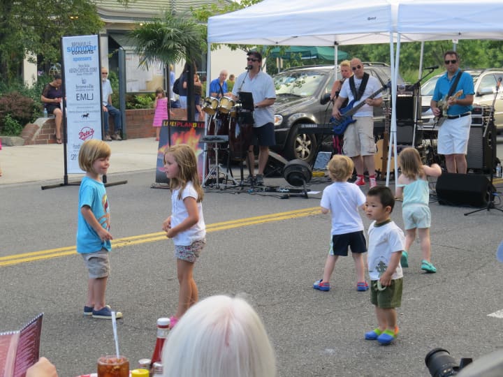 Bronxville youngsters dancing in the street. 