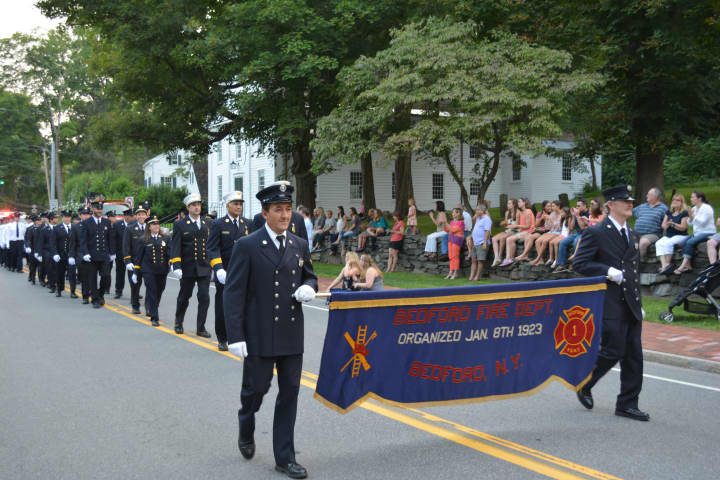 Bedford firefighters march in their parade.