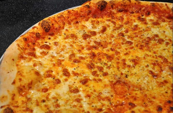 Tasty pizza is listed as a top 21 thing to know before moving to Yonkers. 